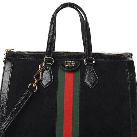 gucci black suede handbag.